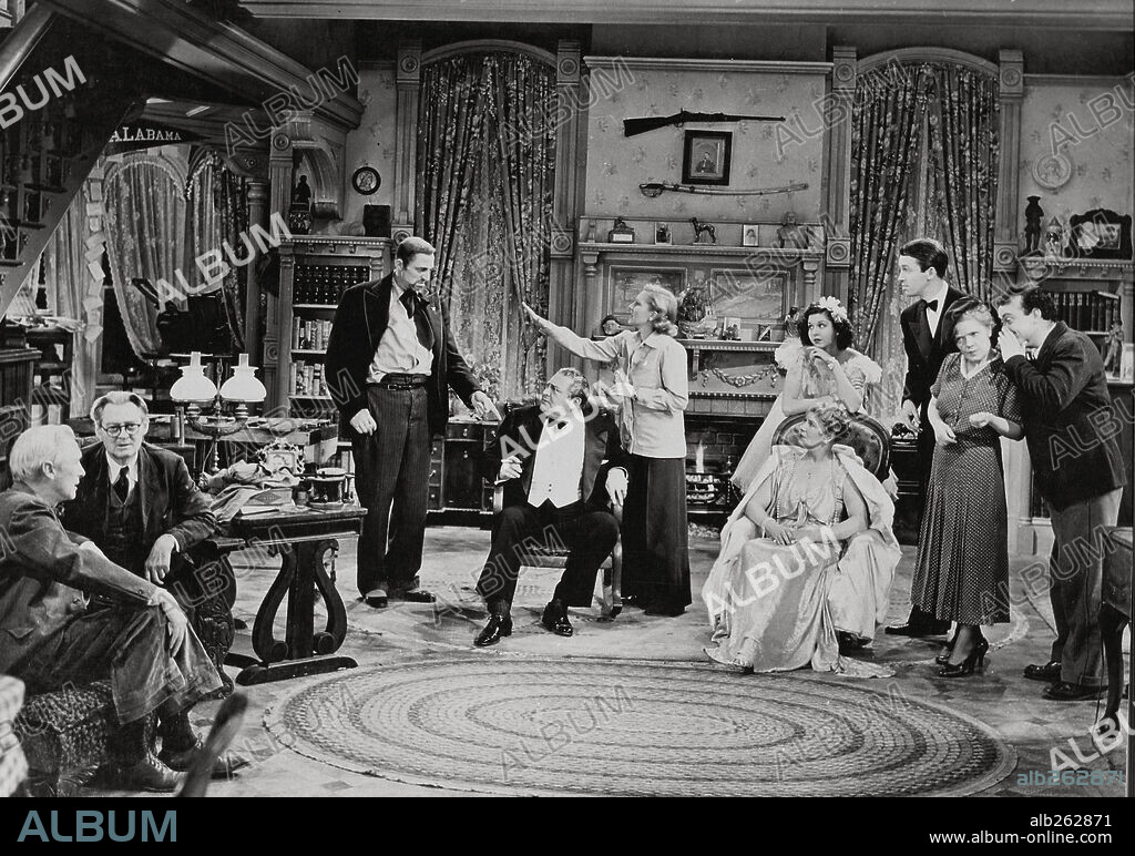 EDWARD ARNOLD, JAMES STEWART, JEAN ARTHUR, LIONEL BARRYMORE and MISCHA AUER in YOU CAN'T TAKE IT WITH YOU, 1938, directed by FRANK CAPRA. Copyright COLUMBIA PICTURES.