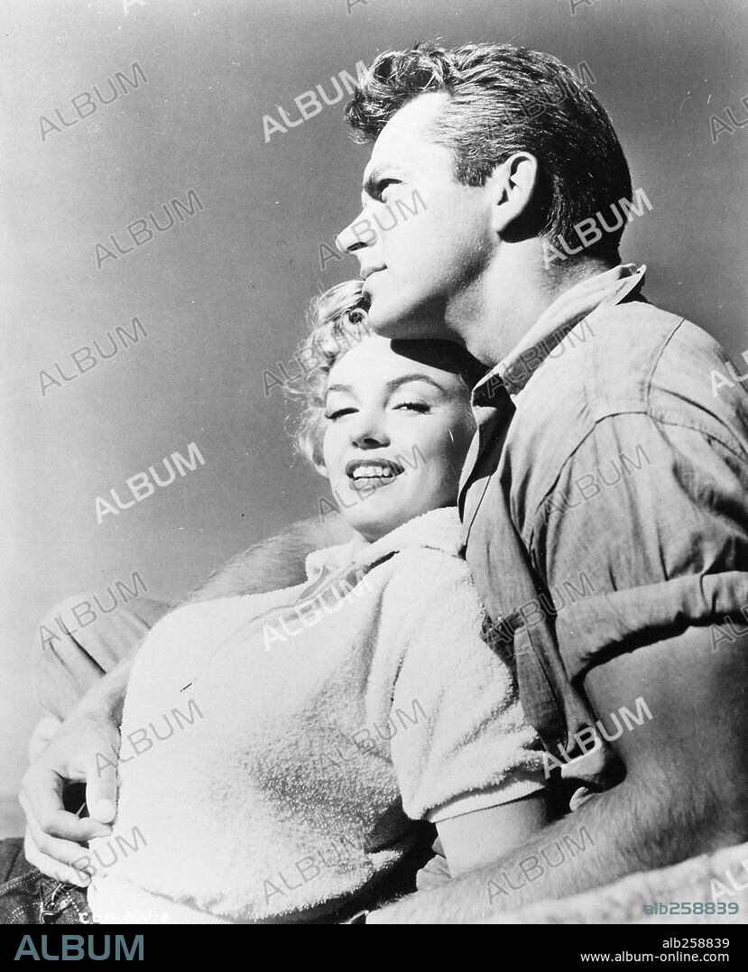 KEITH ANDES and NORMA JEAN BAKER. KEITH ANDES and MARILYN MONROE in CLASH BY NIGHT, 1952, directed by FRITZ LANG. Copyright RKO.