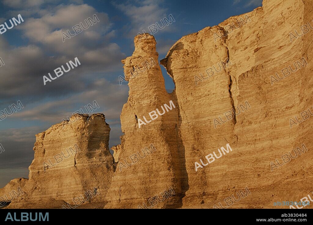 Monument Rocks National Natural Landmark near Oakley, Kansas. These chalk layers were deposited in the Western Interior Seaway over 80 million years ago. Wind and water then carved them into the shapes we see today.