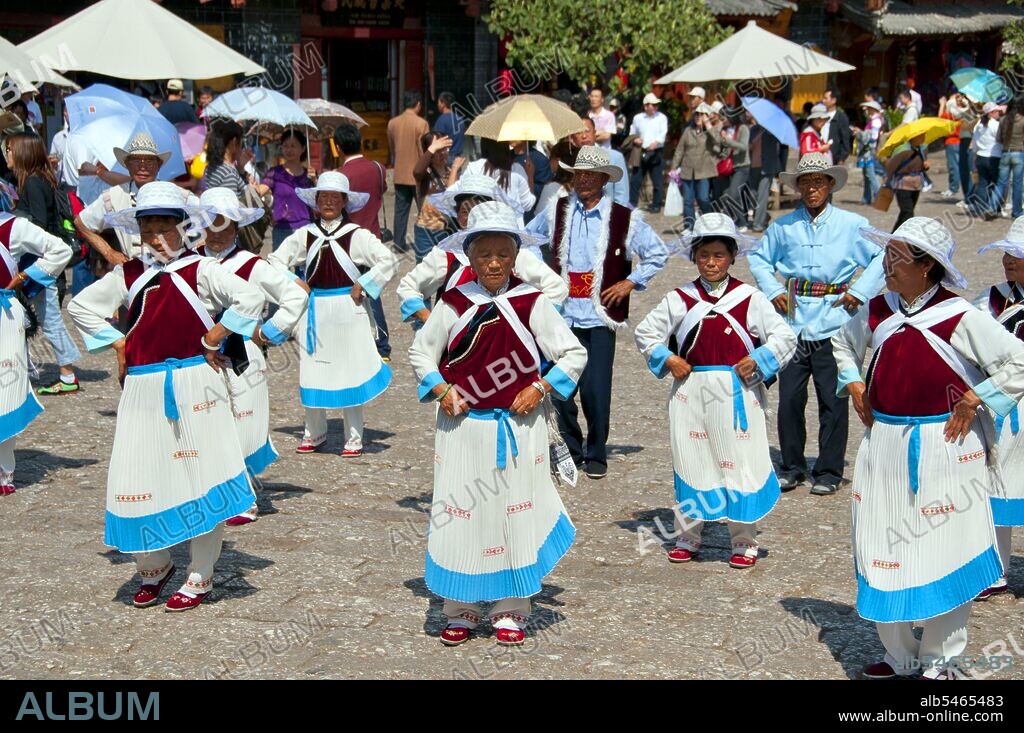 The Naxi or Nakhi are an ethnic group inhabiting the foothills of the Himalayas in the northwestern part of Yunnan Province, as well as the southwestern part of Sichuan Province in China. The Naxi are thought to have come originally from Tibet and, until recently, maintained overland trading links with Lhasa and India. The Naxi form one of the 56 ethnic groups officially recognized by the People's Republic of China. The Naxi are traditionally followers of the Dongba religion. Through both Han Chinese and Tibetan cultural influences, they adopted Tibetan Buddhism and, to a lesser extent, Taoism, in the 10th century. The Old Town of Lijiang dates back more than 800 years and was once an important town on the old Tea Horse Road.