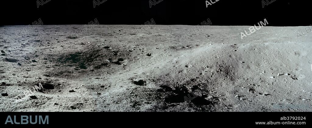 Apollo 11 image of double crater on lunar surface.
