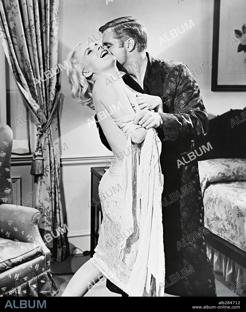 CARROLL BAKER y GEORGE PEPPARD en LOS INSACIABLES, 1964 (THE CARPETBAGGERS), dirigida por EDWARD DMYTRYK. Copyright PARAMOUNT/EMBASSY.