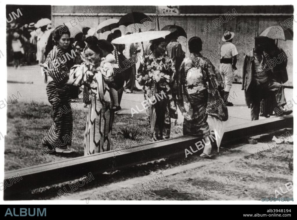 Japanese women by the Zeppelin hangar, Kasumigaura, Japan, 1929 (1933). A photograph from Zeppelin-Weltfahrten, Vom ersten Luftschiff 1899 bis zu den Fahrten des LZ127 Graf Zeppelin 1932, Dresden, 1933.