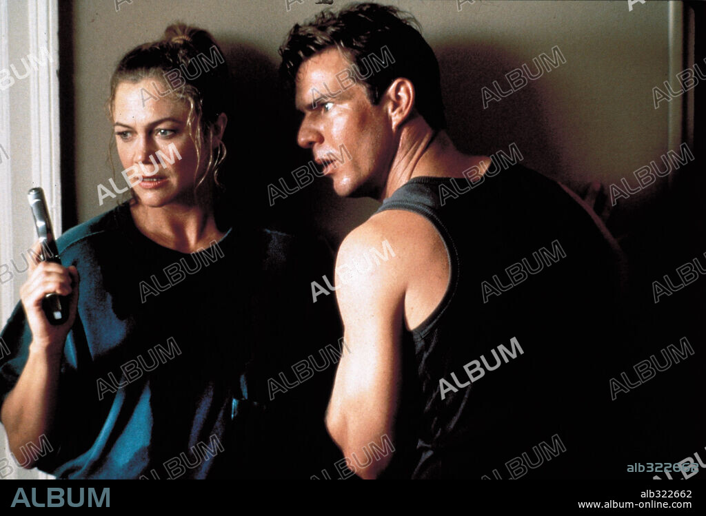 DENNIS QUAID and KATHLEEN TURNER in UNDERCOVER BLUES, 1993, directed by HERBERT ROSS. Copyright M.G.M.