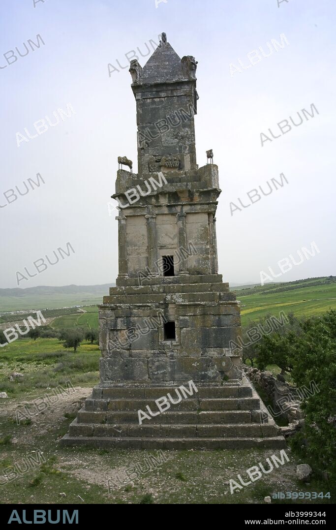 The Mausoleum of Ateban, Dougga (Thugga), Tunisia. The Mausoleum of Ateban is the only surviving Numidian/Punic structure in Tunisia. It was built in the second century for Ateban, a contemporary of Masinissa, son of Jepmatath and grandson of Palu. The monument with shows Hellenistic and Egyptian influences. A six-stepped substructure supports a square plinth with pilasters topped by Aeolic capitals at the corners. The tomb chamber was entered through two windows which were closed by stone panels. Above this are three steps bearing the second story, which is articulated by fluted Ionic semi-columns. A further three steps lead up to the third story, at the corners of which stood equestrian statues. The final stage is a pyramidal roof.