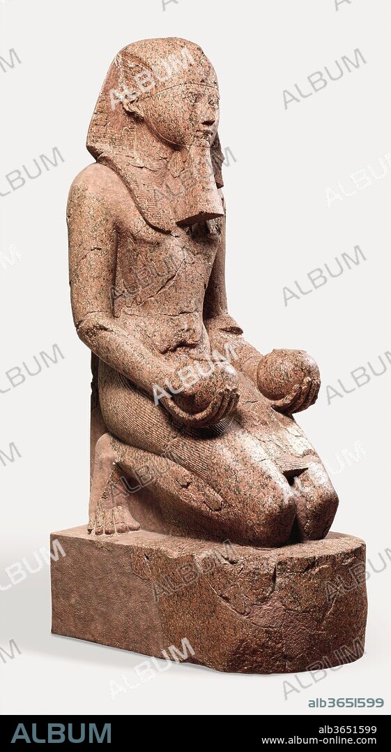 Large Kneeling Statue of Hatshepsut. Dimensions: H. 261.5 cm (102 15/16 in.); W. 80 cm (31 1/2 in.); D. 137 cm (53 15/16 in.). Dynasty: Dynasty 18. Reign: Joint reign of Hatshepsut and Thutmose III. Date: ca. 1479-1458 B.C..
On the upper terrace of Hatshepsut's temple at Deir el-Bahri, the central sanctuary was dedicated to the god Amun-Re, whose principal place of worship was Karnak temple, located across the Nile, on the east bank of the river. During a yearly festival, called the Beautiful Feast of the Valley, the god's image was transported across the river to the west bank. Carrying the god in his sacred barque, the festival procession followed a roadway lined with sphinxes that led to Hatshepsut's temple. On the middle terrace, the pathway was flanked by colossal kneeling statues that represented Hatshepsut as the ideal Egyptian king - a young man in the prime of life. 
Some of the statues were depicted wearing the white crown of Upper Egypt (see 30.3.1). Others, like this one and 30.3.2, wear the <i>nemes</i>-headcloth. Hatshepsut also wears the false beard and <i>shendyt</i>-kilt that are part of the regalia of a king. The inscription on this statue indicates that Hatshepsut is offering Amun <i>Maat</i> (translated as order, truth, or justice). By making this offering, Hatshepsut affirms that <i>Maat</i> is the guiding principal of her reign. 
The Fragments of these statues were discovered during several seasons of excavations by the Museum's Egyptian Expedition. The statues were reassembled as much as possible in the field (see attached photographs). In the division of finds, the most complete examples were sent to the Egyptian Museum in Cairo. Fragments of the statues given to the Metropolitan Museum were reconstructed in New York by attaching them to metal armatures and filling in the gaps with plaster (see attached photograph). Although the plaster has been tinted to blend with the stone, it is possible to distinguish the original stone fragments from the plaster fill.