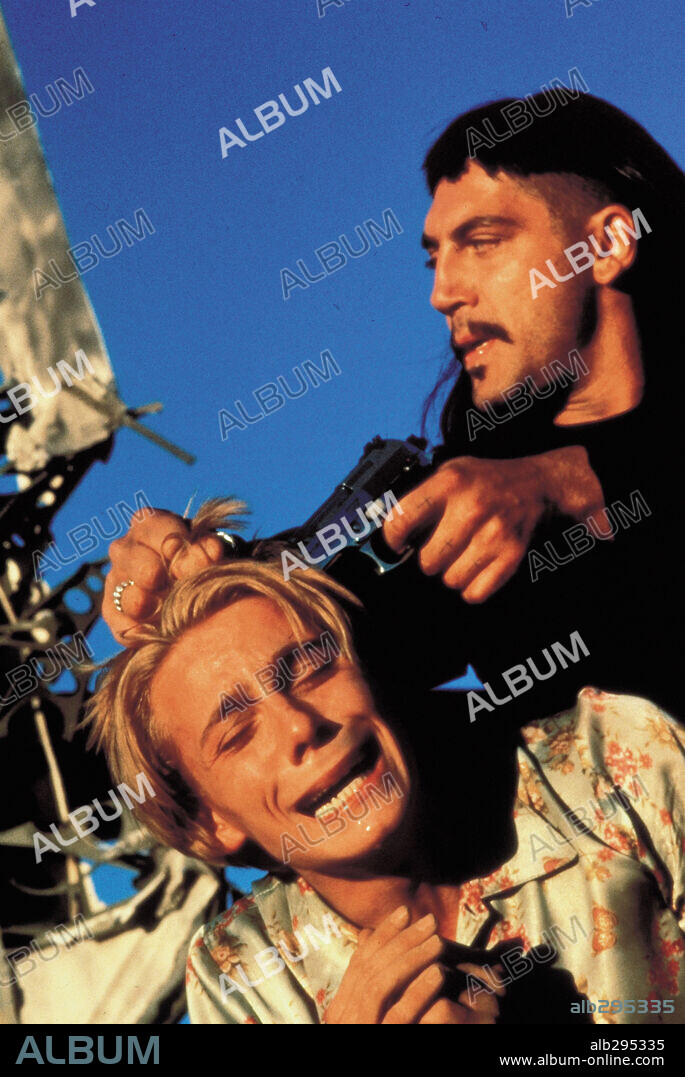 JAVIER BARDEM in DANCE WITH THE DEVIL, 1997 (PERDITA DURANGO), directed by ALEX DE LA IGLESIA. Copyright SOGETEL.