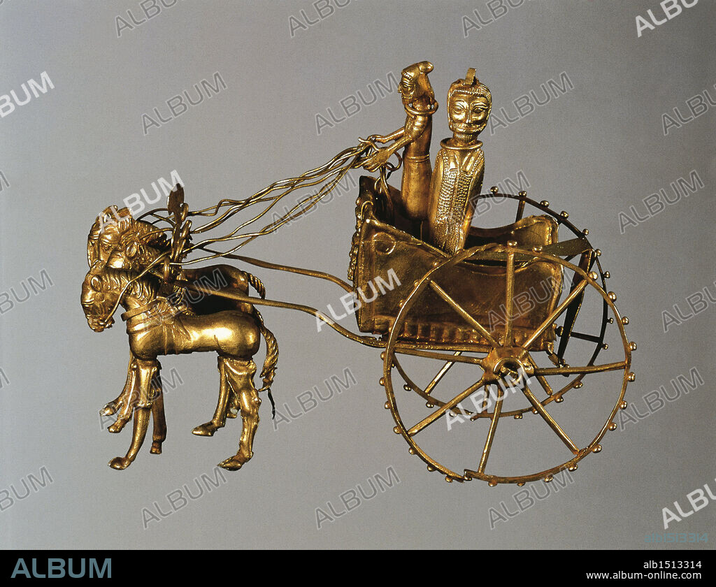 Persian civilization, Achaemenid Period, 5th-4th century b.C. Goldsmithery. Oxus treasure. Gold model of chariot drawn by four horses. Passengers are portrayed wearing Medes clothes.