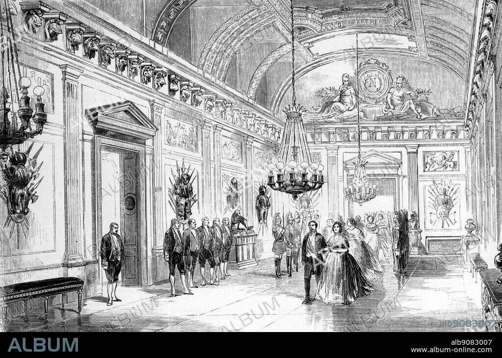 From l'Illustration 26th November 1859. The Emperor Napoleon III and the Empress Eugenie crossing the Salle des Gardes at the Chateau of Compiegne.