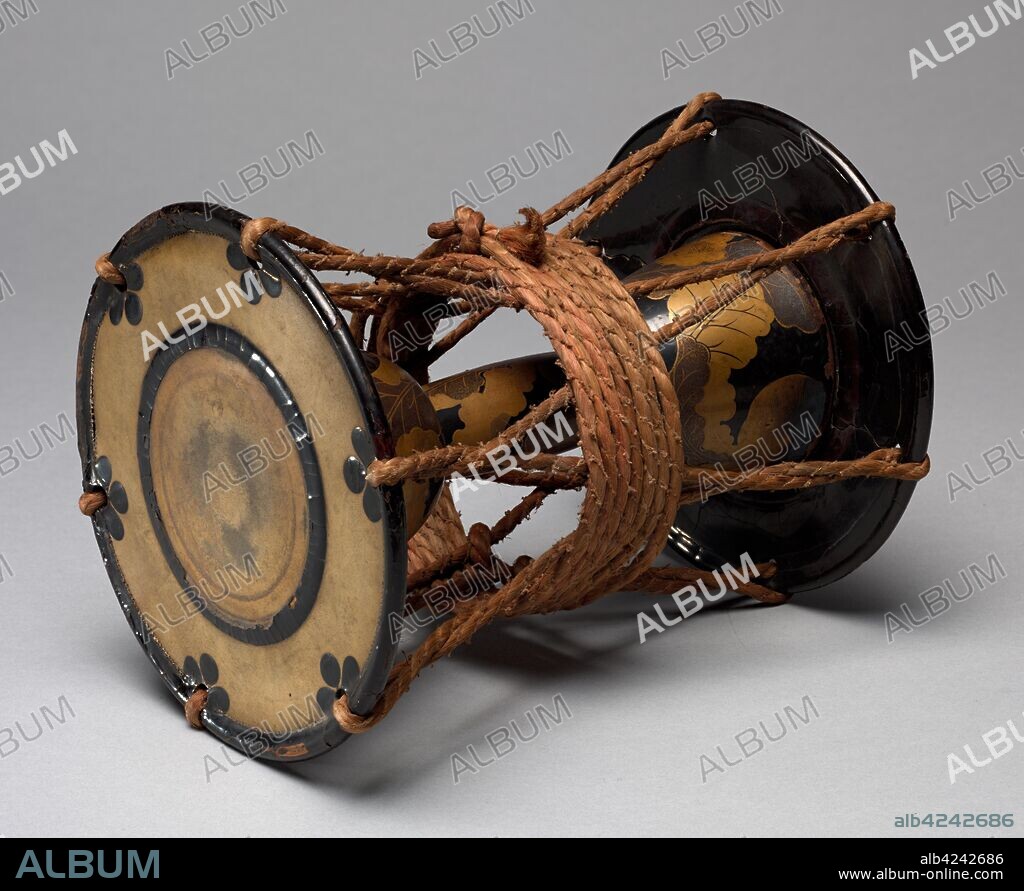Tsuzumi Drum, 1800s. Japan, Edo (1615-1868) - Meiji (1868-1912) periods. Wood with lacquer and sprinkled gold powder (maki-e), hide, iron, and cord; diameter: 20.4 cm (8 1/16 in.); overall: 25.4 cm (10 in.).