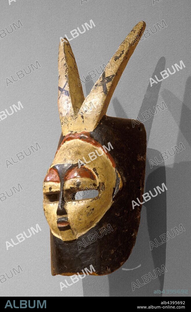 face mask for Ekpo association, Benin Kingdom, Edo people, 1920-1950, wood, pigment, H: 14-1/16 in., African Art.