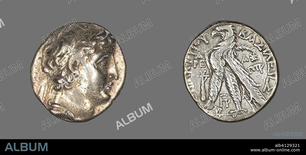 ANCIENT GREEK. Tetradrachm (Coin) Portraying Demetrius II Nikator of Syria. Greek, minted in Tyre. Date: 130 BC-129 BC. Dimensions: Diam. 2.6 cm; 14.05 g. Silver. Origin: Tyre.