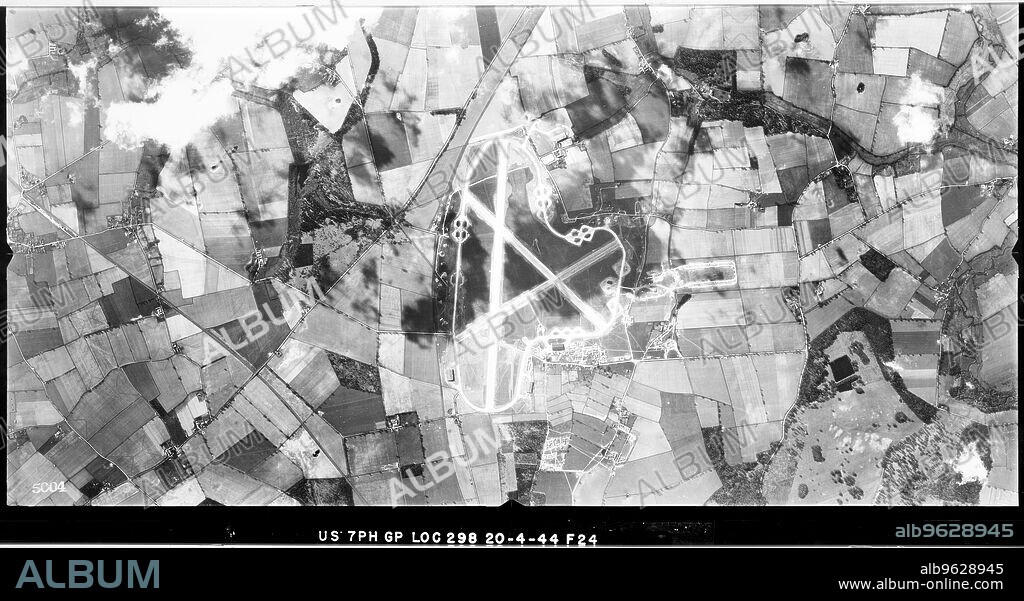 USAAF PHOTOGRAPHER. RAF Oulton, Norfolk, 1944. The air base was constructed in 1939-1940 as a bomber airfield. In 1943 it was expanded and given concrete runways for use by heavy bombers.