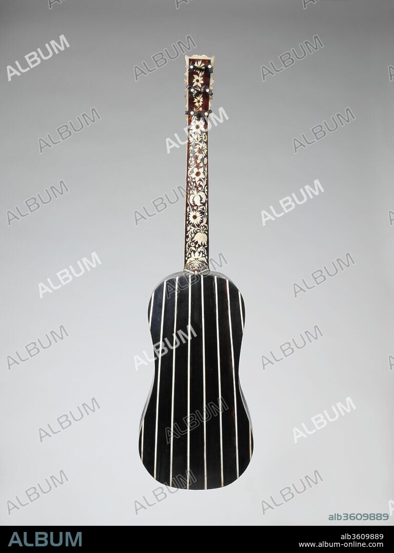Guitar. Culture: German. Maker: Joachim Tielke (German, 1641-1719). Date: ca. 1695-99.
The Baroque guitar is similar in shape and body to earlier guitars, but is typified by five double courses of strings (which appeared as early as the late fifteenth century). From about 1600 until the mid-eighteenth century, its popularity supplanted both the four-course guitar and the six- or seven-course vihuela. The five-course Baroque guitar was a bit larger than the earlier model, averaging approximately 92 centimeters long, with string lengths of 63-70 centimeters. Guitars used by musicians were probably relatively plain, perhaps typified by many Spanish guitars of the period. However, many decorative guitars survive, including those by the Sellas family of Venice and Bologna and by Jean-Baptiste Voboam in Paris (1990.103; 1989.147).
Tielke's use and mastery of expensive material is proof of the financial success of his workshop and business. This instrument's ribs and back are constructed with alternating strips of ebony and ivory, and the edges of the sound table and sound hole are decorated with ornate inlay. There is evidence that the sound hole once held a rosette.