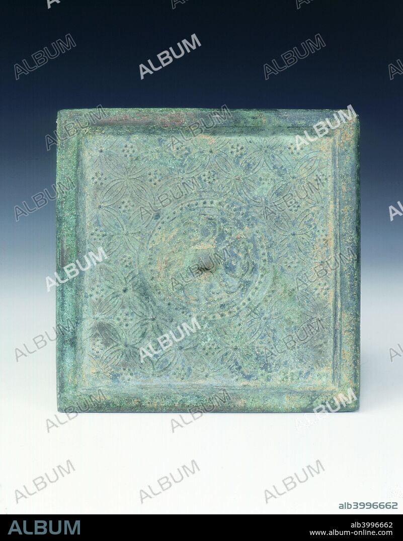 Square bronze mirror with overlapping cash pattern, Jin dynasty, China, 1115-1234. A small thin square bronze mirror with small bridge knob in the centre of a swirling flower surrounded by a circle of dots. The remainder is decorated with a background of overlapping cash patterns, with raised bumps where the cash interlock.