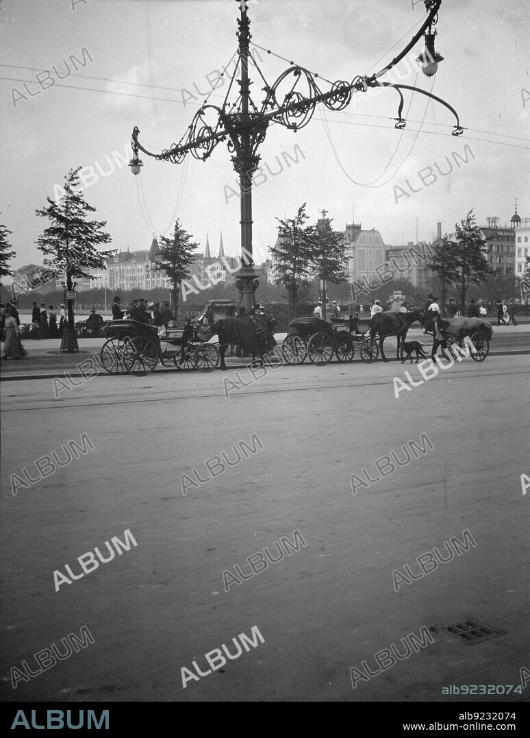 ARNOLD GENTHE. Travel views of Europe, between 1904 and 1938. Open carriages and overhead catenaries for trams.