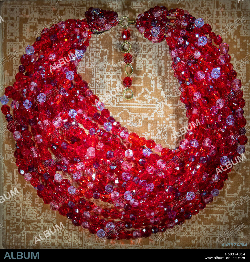 Vicenza, Jewellery Museum, room Fashion: multi strand bead necklace attributed to EMILIO PUCCI, designed by Lyda Coppola; early 2960s; strung fire polished faceted glass beads in several shades of red.