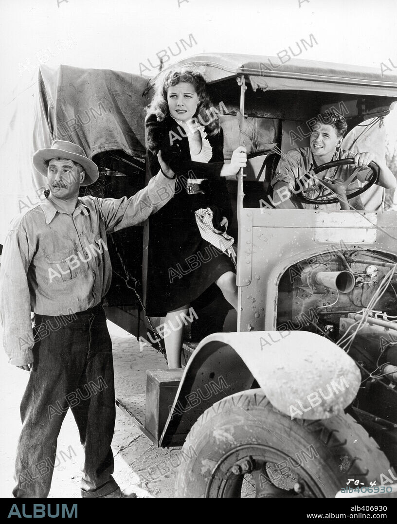 ANN SHERIDAN, GEORGE TOBIAS and RONALD REAGAN in JUKE GIRL, 1942, directed by CURTIS BERNHARDT. Copyright WARNER BROTHERS.