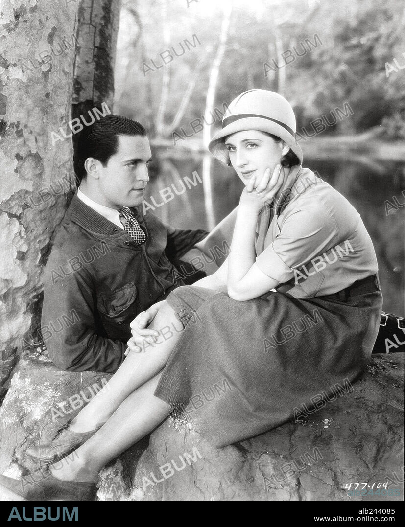 CHESTER MORRIS and NORMA SHEARER in THE DIVORCEE, 1930, directed by ROBERT Z. LEONARD. Copyright M.G.M.