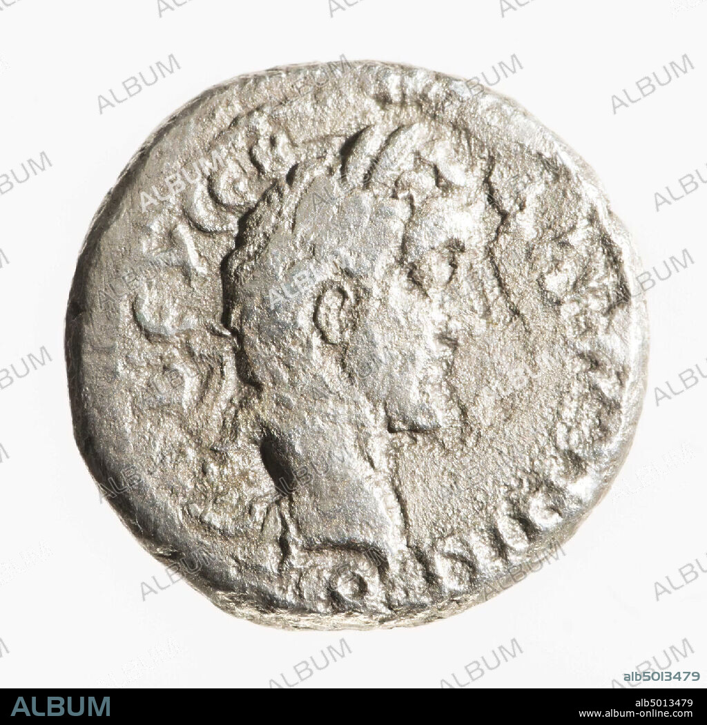 Obverse: Antoninus Pius, right, honored. Greek inscription: ANTONINUS CEB EUCEB Reverse: Hades-Serapis, crowned, dressed, left, staff in left hand, right hand reaches Cerberus. Greek inscription: LH., Coin, tetradrachm of Antoninus Pius, metal, silver, trillion, diam: 2.2 cm, wt. 11.27 grams, 138-161 AD, unknown.