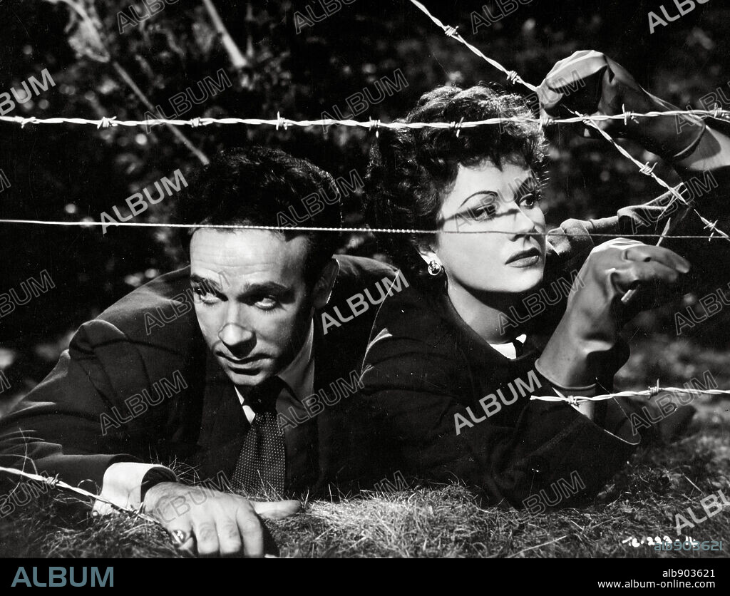 DANE CLARK and MARGARET LOCKWOOD in HIGHLY DANGEROUS, 1950, directed by ROY WARD BAKER. Copyright TWO CITIES.
