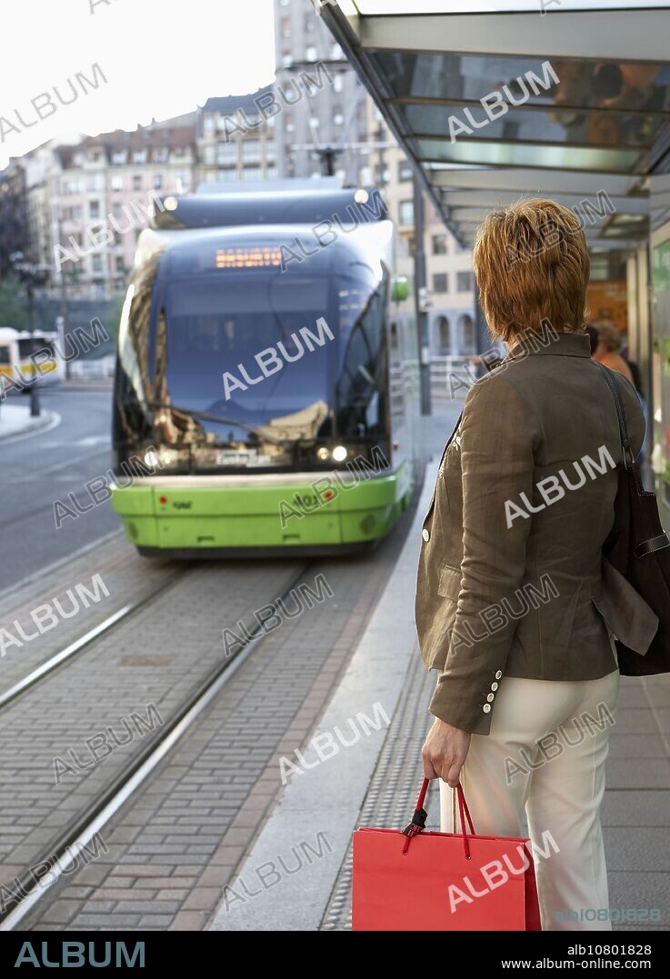 Commuters. Tramway. Bilbao, Bizkaia, Euskadi. Spain.