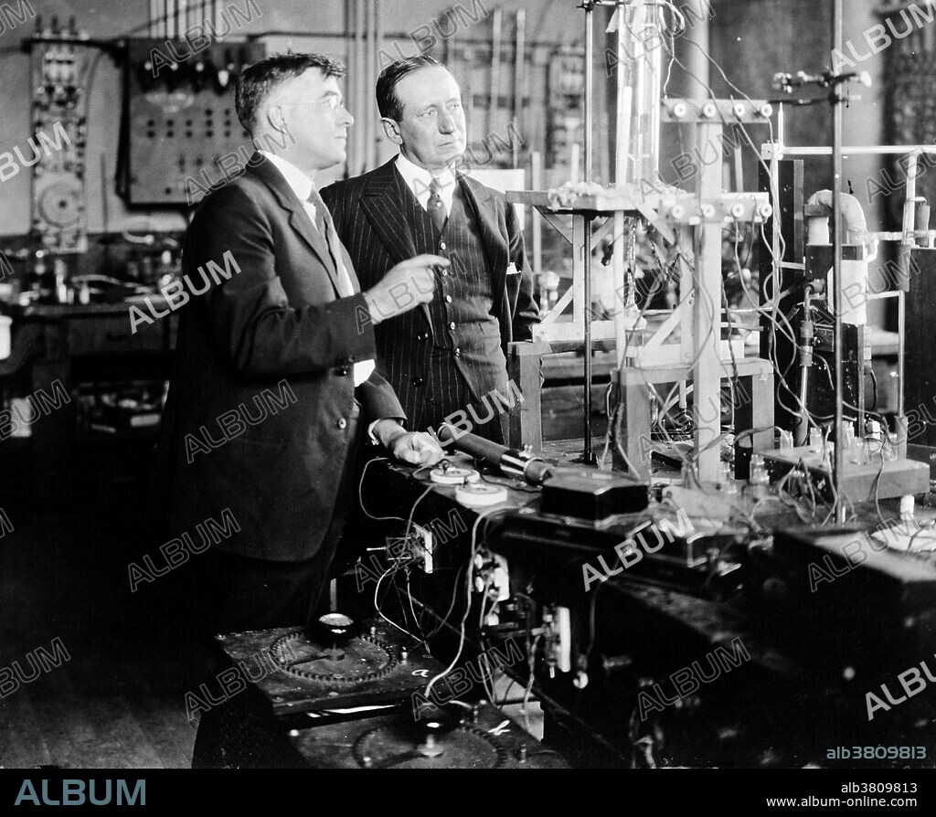 Langmuir and Marconi in the General Electric Research Laboratory, New York, 1922. Irving Langmuir ( January 31, 1881 - August 16, 1957) was an American chemist and physicist. He advanced several basic fields of physics and chemistry, invented the gas-filled incandescent lamp, the hydrogen welding technique, and was awarded the 1932 Nobel Prize in Chemistry for his work in surface chemistry. Guglielmo Marconi (April 25, 1874 - July 20 1937) was an Italian inventor, known as the father of long distance radio transmission and for his development of Marconi's law and a radio telegraph system. Marconi is often credited as the inventor of radio, and he shared the 1909 Nobel Prize in Physics with Karl Ferdinand Braun.