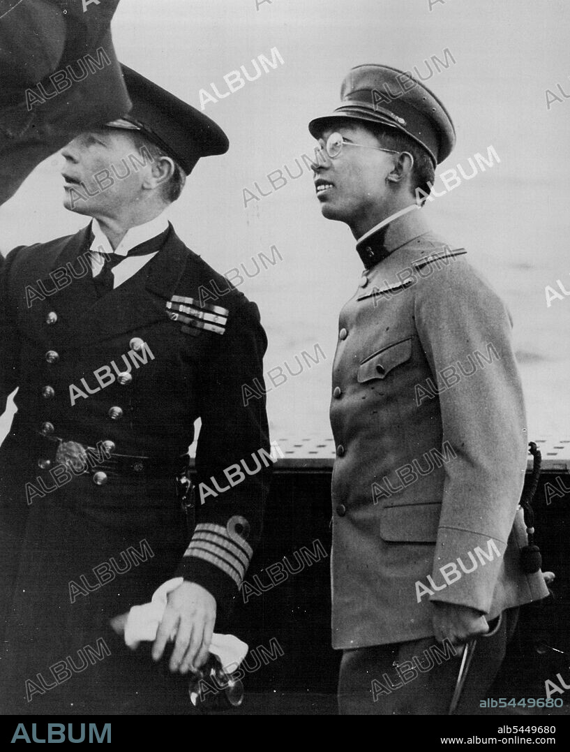 Prince Chichibu looking up at the Victory.Prince Chichibu of Japan looks into English Naval History at Portsmouth Dockyard, where he visited the historic Victory. (April 19th). December 4, 1950.