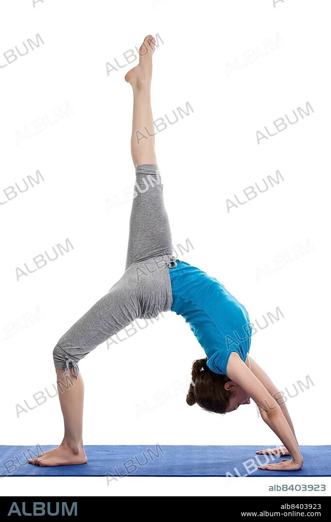 Yoga, young beautiful woman yoga instructor doing Wheel Pose with one leg lifted straight up (Eka Pada Chakrasana) exercise isolated on white background.