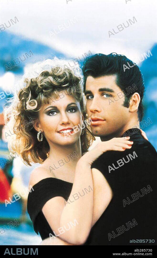 OLIVIA NEWTON JOHN y TRAVOLTA JOHN. JOHN TRAVOLTA y OLIVIA NEWTON-JOHN en GREASE, 1978, dirigida por RANDAL KLEISER. Copyright PARAMOUNT PICTURES.