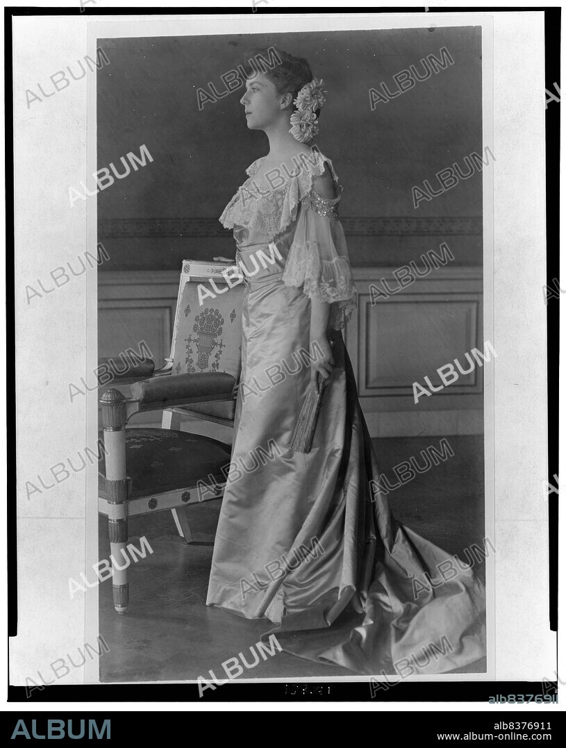 FRANCES BENJAMIN JOHNSTON. Alice Roosevelt Longworth, full-length portrait, standing next to chair, facing left, 1903. [Daughter of President Theodore Roosevelt and his first wife Alice Hathaway Lee].