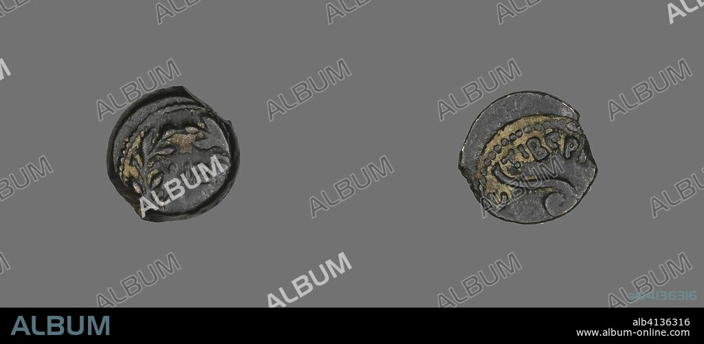 JUDEAN. Coin Depicting an Olive Wreath. Roman; Palestine. Date: 30 AD-31 AD. Dimensions: Diam. 1.6 cm; 2.44 g. Bronze. Origin: Israel.