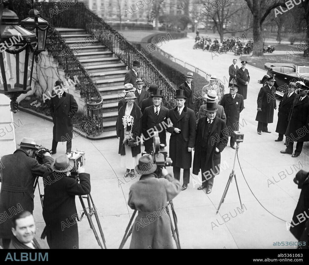 Eleanor Roosevelt and U.S. President Franklin D. Roosevelt with photographers outside White House on Inauguration Day, Washington DC, USA, March 4, 1933.