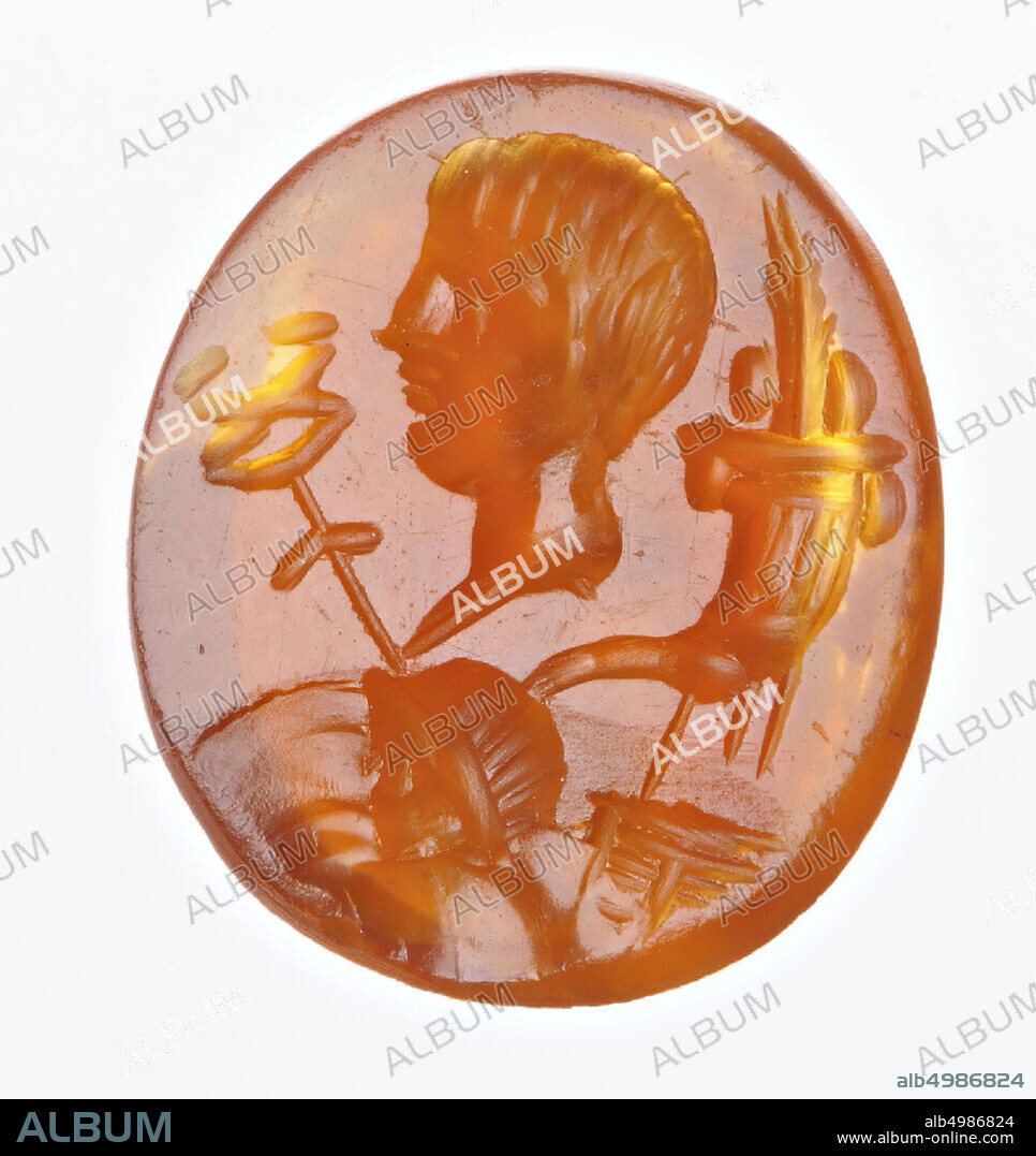 Vz: the round head of a little boy depicted with short hair is put on a mask, flanked by a caduceus on the left and a cornucopia on the right, under the cornucopia a syrinx., Gem, intaglio, ringstone , carnelian, Color: red, Shape: round, Processing: Maaskant-Kleibrink, M., Catalog of the engraved gems in the Royal Coin Cabinet, 1978, p.60, fig.2, type F1, Method: rendered with a thick rounded drill, detailing with thick parallel disc grooves, 11 x 9.5 mm, D. 3 mm, 2nd half 1st century BC. -50.