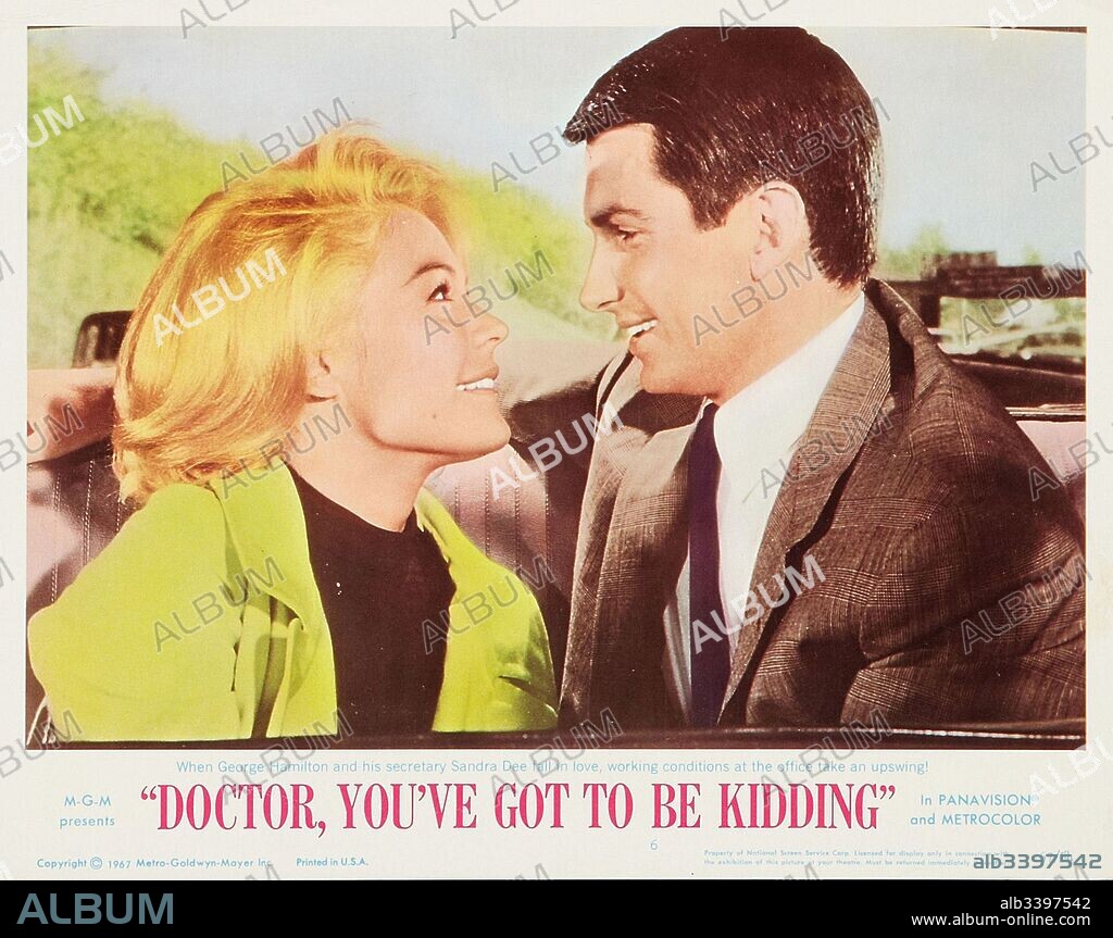 George Hamilton and SANDRA DEE in DOCTOR, YOU'VE GOT TO BE KIDDING!, 1967, directed by PETER TEWKSBURY. Copyright TRIDENT FILMS.