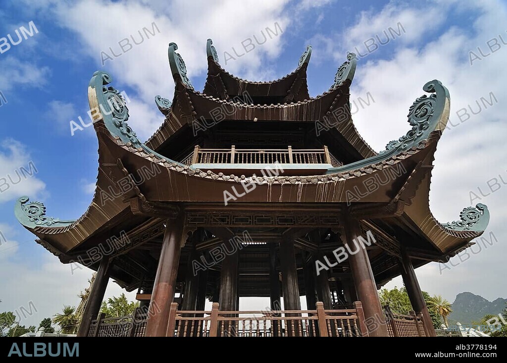 Bell tower with one of the heaviest bells in the world, construction site at the Chua Bai Dinh pagoda, to become one of the largest pagodas in Southeast Asia, near Ninh Binh, Vietnam, Southeast Asia