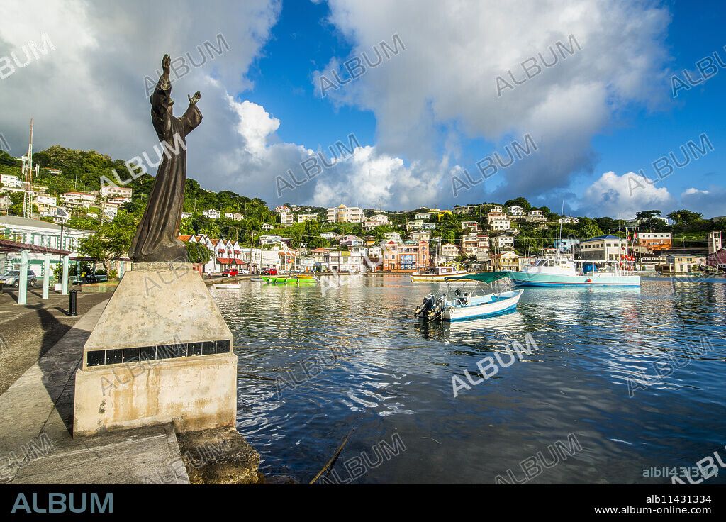 St. George's statue in the inner harbour of St. Georges, capital of Grenada, Windward Islands, West Indies, Caribbean, Central America.