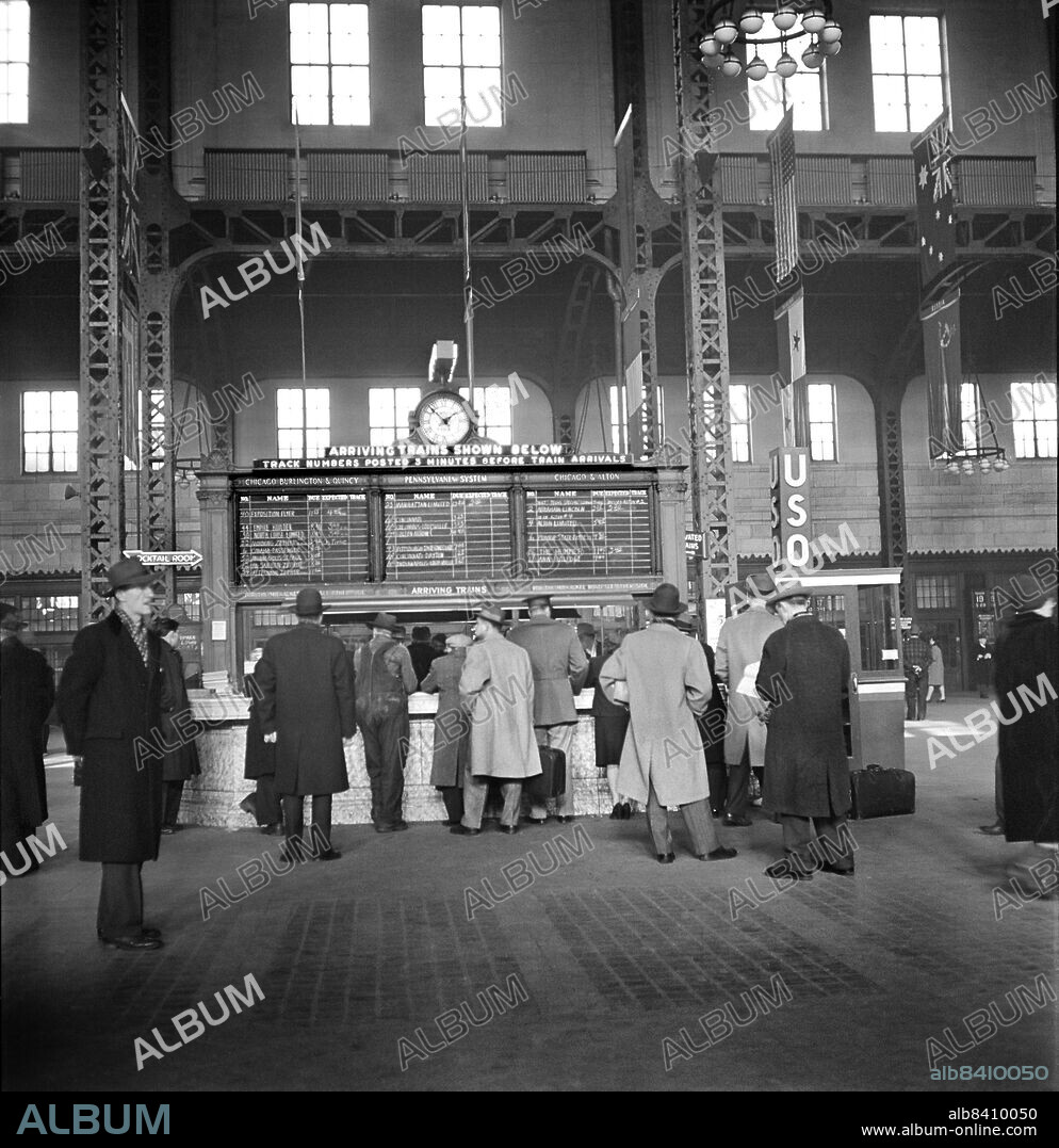 Group of People at Information Booth, Union Station, Chicago, Illinois, USA, Jack Delano, U.S. Office of War Information/U.S. Farm Security Administration, January 1943.
