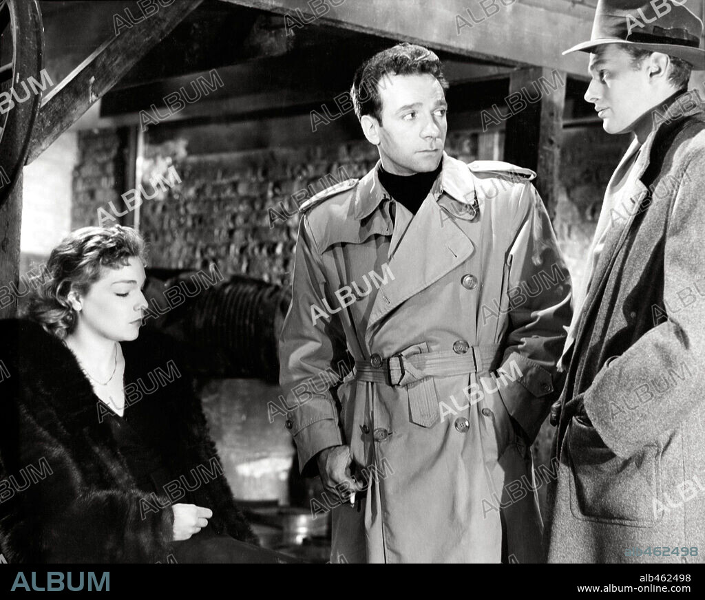 DANE CLARK, ROBERT DUKE and SIMONE SIGNORET in GUNMAN IN THE STREETS, 1950, directed by FRANK TUTTLE. Copyright FILMS SACHA GORDINE.