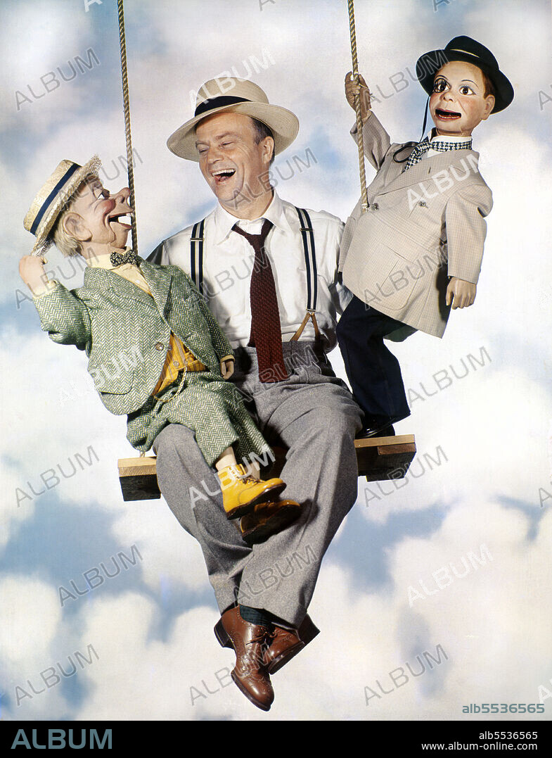 Edgar Bergen, (1903-1978), American Actor and Ventriloquist, seated Portrait with his Ventriloquist Dummies Mortimer Snerd and Charlie McCarthy, Harry Warnecke, Robert F. Cranston, Gus Schoenbaechler, 1948.
