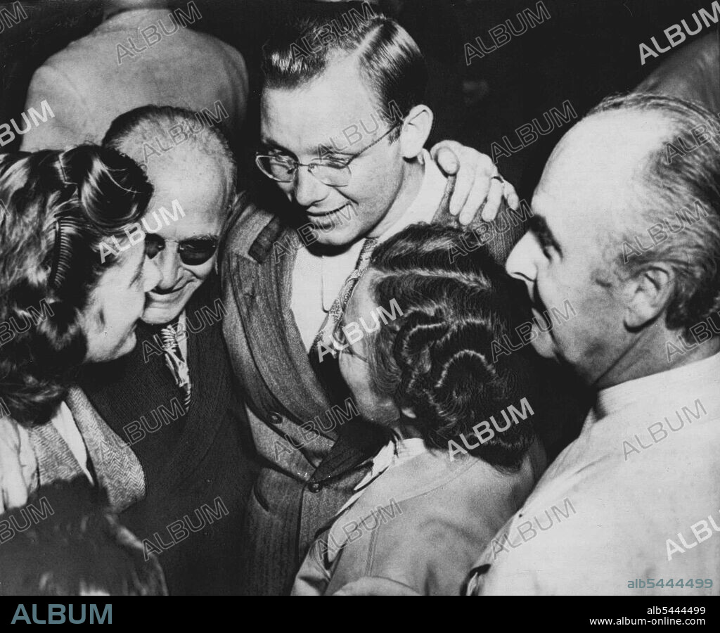 Gollum And Family Rejoice -- George (Bud) Gollum Rejoices with his family after the "not guilty" verdict. L to R-Willafred Gollum, his sister, his step father, *****. Joseph Stomel, Gollum, his mother, Mrs. Joseph ***** and his attorney William Bierne. May 12, 1952. (Photo by AP Wirephoto).