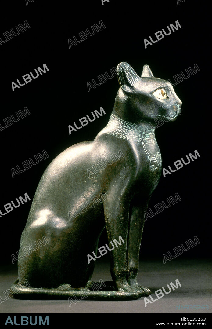 DIOSA EN FORMA DE GATO BASTET.  PERIODO SAITA. PERIODO TARDIO. XXVI DINASTIA. HACIA 600 A.C. BRONCE.