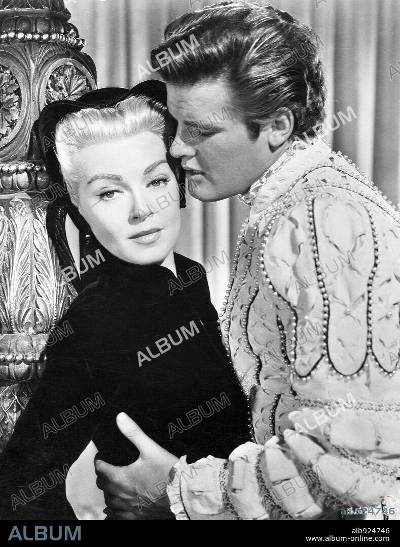 LANA TURNER and ROGER MOORE in DIANE, 1956, directed by DAVID MILLER. Copyright M.G.M.