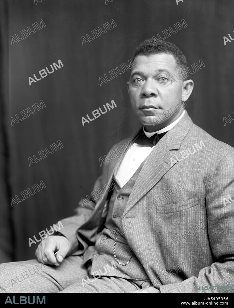 Editorial use only . Booker Taliaferro Washington (1856-1915) was an African American educator and author. He was born into slavery to an enslaved woman, and a white father. He worked his way through Hampton Normal and Agricultural Institute and attended college at Wayland Seminary. In 1881 he was named as the first leader of the new Tuskegee Institute in Alabama, a private, black university. Washington attained national prominence for his Atlanta Address of 1895: a verbal agreement between African American leaders and Southern white leaders. He was a supporter of education for freedmen in the post-Reconstruction, Jim Crow-era South. He had a nationwide network of supporters including black educators, ministers, editors, and businessmen. His autobiography, Up From Slavery, first published in 1901, is still widely read today. Photographed by Frances Benjamin Johnston, 1895.