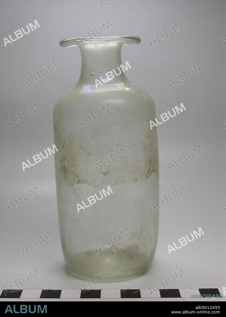 bottle, Bottle of decolourising, transparent glass. The bottle has a cylindrical body with a slightly raised bottom, a short cylindrical neck and a trumpet-shaped mouth with folded round lip edge., Bottle, glass, free-blown, h. 13.2 cm, diam. 5.5 cm, Greco-Roman Period, Roman imperial time 3rd-4th Century, Egypt.