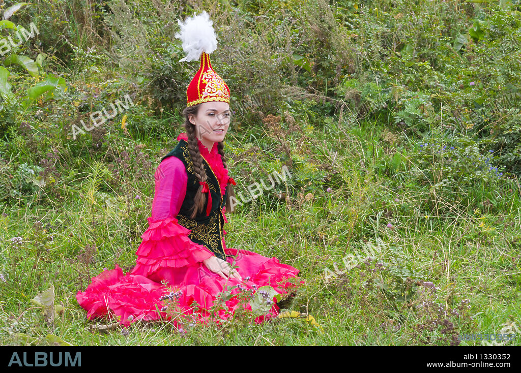 Young Kazakh woman, Kazakh ethnographical village Aul Gunny, Talgar city, Almaty, Kazakhstan, Central Asia, Asia.