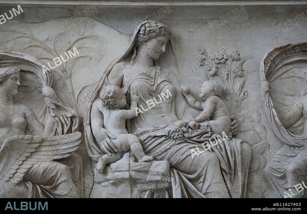 Italy. Rome. Ara Pacis Augustae. A goddess Tellus (Earth) sits amid a scene of fertility and prosperity with twins. Or Goddess Pax. 13-9BC.