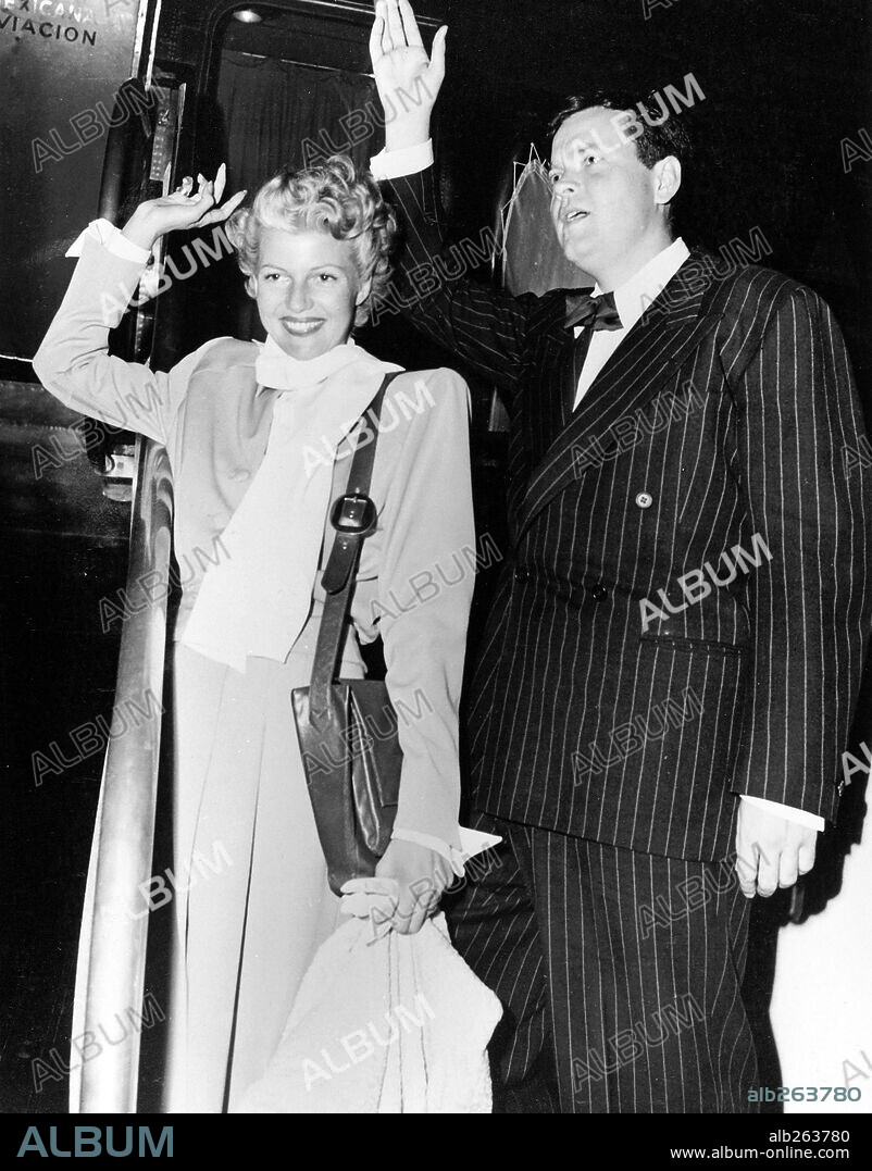 ORSON WELLES and RITA HAYWORTH.