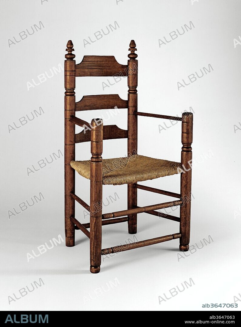 Slat-back armchair. Culture: American. Dimensions: 42 x 24 x 15 1/8 in. (106.7 x 61 x 38.4 cm). Date: 1650-90.
This is an example of the earliest known type of turned slat-back chair made in New England. The back consists of three broad, horizontal slats with straight upper edges cut away at the ends. The slats are graduated in height, with the largest at the top. Turned chairs with slat backs were found in both modest and affluent homes, where they provided practical, everyday seating alongside more fashionable and costly forms.