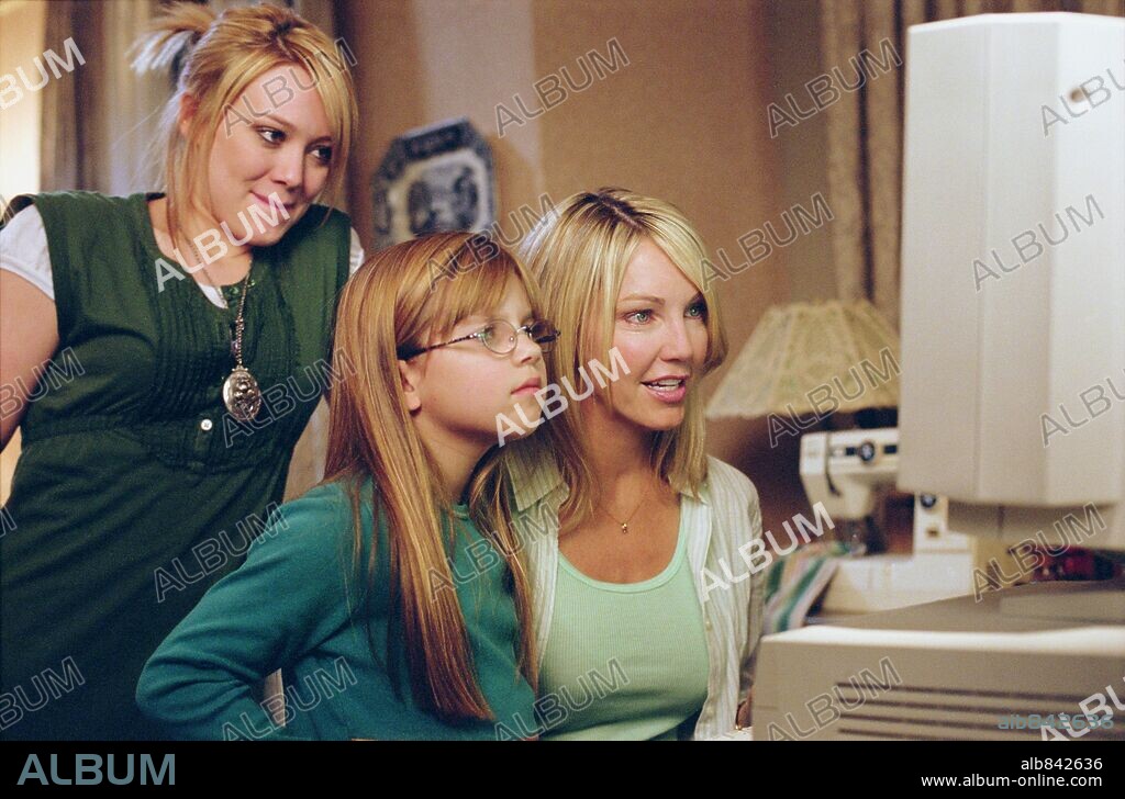 HEATHER LOCKLEAR et HILARY DUFF dans THE PERFECT MAN, 2005, réalisé par MARK ROSMAN. Copyright UNIVERSAL STUDIOS / GIRAUD, SOPHIE.